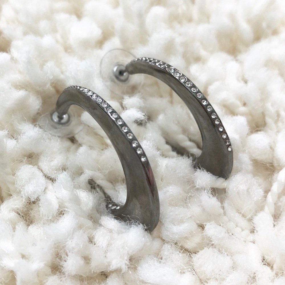Express dark silver hoop earrings with crystals